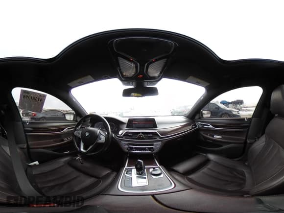 ✅ 2018 BMW 7 Series 740i xDrive • VIN: WBA7E4C59JGV23876 • Lot: 41381398. Listed on IAAI with 106,675 mi. Free auction sales archive from the USA and detailed vehicle history report at DreamBid. Image 18.