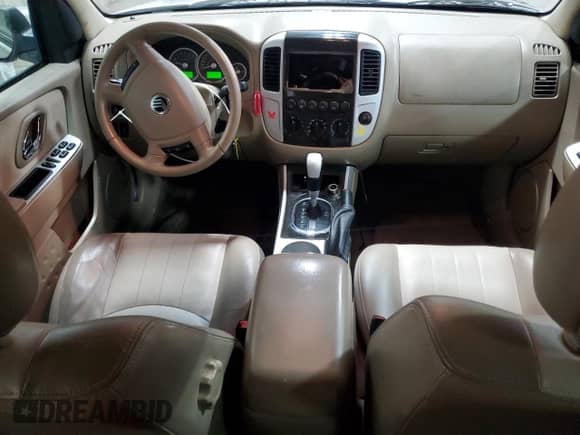 2007 Mercury Mariner Premier с VIN 4M2CU97127KJ20010, выставлен на аукционе Copart как лот 52123205 с пробегом 162 337 миль миль и Списание • Salvage title. История ставок и продаж доступна на DreamBid. Изображение 8.