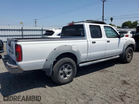 ✅ 2002 Nissan Frontier XE • VIN: 1N6ED29X12C379157 • Lot: 57347215. Listed on Copart with 206,559 mi. Free auction sales archive from the USA and detailed vehicle history report at DreamBid. Image 3.