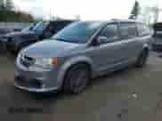 2016 Dodge Grand Caravan American Value z VIN 2C4RDGBG9GR205024, wystawiony jako Copart lot #85703905 z przebiegiem 170 532 mil mil oraz Szkoda całkowita • Salvage title. Historia ofert i sprzedaży dostępna na DreamBid. Obrazek 1.