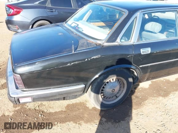 ✅ 1988 Jaguar XJ • VIN: SAJHV1649JC540968 • Лот: 43657666. Опубликован ранее на IAAI с пробегом Не указан. Бесплатный доступ к архиву аукционных продаж из США и подробный отчёт об истории автомобиля на DreamBid. Изображение 6.
