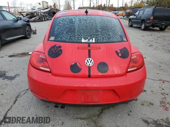 ✅ 2013 Volkswagen Beetle 2.5L • VIN: 3VWHX7AT8DM604332 • Lot: 79781264. Listed on Copart with 125,692 mi. Free auction sales archive from the USA and detailed vehicle history report at DreamBid. Image 6.