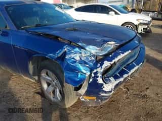 2010 Dodge Challenger SE z VIN 2B3CJ4DV0AH261554, wystawiony jako IAAI lot #43384171 z przebiegiem 147 344 mil mil oraz . Historia ofert i sprzedaży dostępna na DreamBid. Obrazek 6.