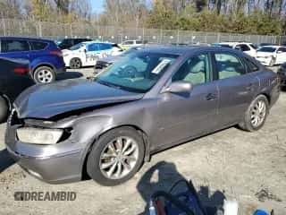 2007 Hyundai Azera SE z VIN KMHFC46FX7A145437, wystawiony jako Copart lot #81969804 z przebiegiem 168 122 mil mil oraz Szkoda całkowita • Salvage title. Historia ofert i sprzedaży dostępna na DreamBid. Obrazek 1.