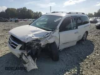 2007 Hyundai Entourage GLS z VIN KNDMC233876033037, wystawiony jako Copart lot #84786415 z przebiegiem 296 766 mil mil oraz Szkoda całkowita • Salvage title. Historia ofert i sprzedaży dostępna na DreamBid. Obrazek 1.