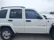 ✅ 2002 Jeep Liberty Limited • VIN: 1J4GL58K32W145911 • Lot: 42162631. Listed on IAAI with 213,446 mi. Free auction sales archive from the USA and detailed vehicle history report at DreamBid. Image 14.