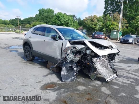 ✅ 2022 Mazda CX-30 Premium Plus • VIN: 3MVDMBEYXNM443646 • Lot: 42209815. Listed on IAAI with 42,128 mi. Free auction sales archive from the USA and detailed vehicle history report at DreamBid. Image 1.
