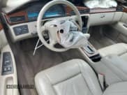 ✅ 1998 Cadillac Eldorado Touring • VIN: 1G6ET1293WU609652 • Lot: 68130755. Listed on Copart with 114,131 mi. Free auction sales archive from the USA and detailed vehicle history report at DreamBid. Image 8.