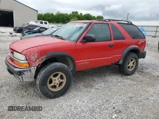 ✅ 1999 Chevrolet Blazer LS • VIN: 1GNCT18W3XK150385 • Lot: 58490985. Wystawiony na Copart z przebiegiem 262 007 mil. Bezpłatny archiwum sprzedaży aukcyjnych z USA i szczegółowy raport historii pojazdu na DreamBid. Zdjęcie 1.