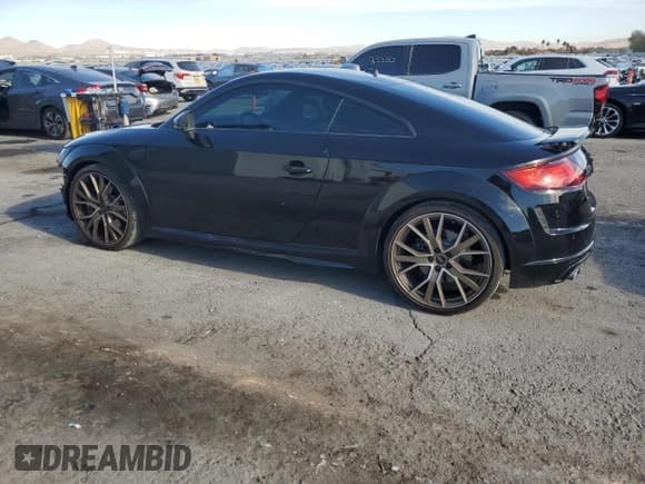 ✅ 2023 Audi TTS • VIN: TRUA1AFV7P1007029 • Lot: 84007784. Wystawiony na Copart z przebiegiem 8 876 mil. Bezpłatny archiwum sprzedaży aukcyjnych z USA i szczegółowy raport historii pojazdu na DreamBid. Zdjęcie 2.
