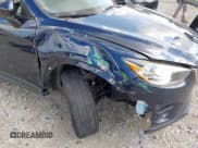 ✅ 2016 Mazda CX-5 Touring • VIN: JM3KE2CY7G0849891 • Lot: 43288504. Listed on IAAI with 133,906 mi. Free auction sales archive from the USA and detailed vehicle history report at DreamBid. Image 6.