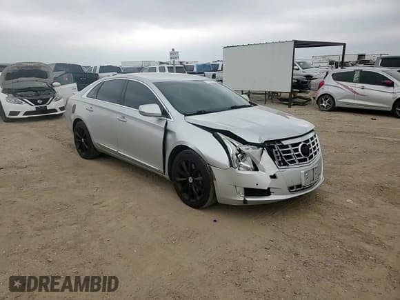 ✅ 2013 Cadillac XTS Luxury • VIN: 2G61R5S39D9222310 • Lot: 71752725. Listed on Copart with 84,925 mi. Free auction sales archive from the USA and detailed vehicle history report at DreamBid. Image 13.