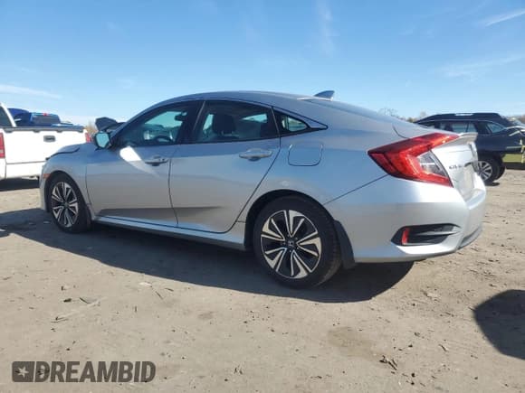 ✅ 2016 Honda Civic EX-T • VIN: 19XFC1F35GE015815 • Лот: 91603015. Опубликован ранее на Copart с пробегом 303 635 миль. Бесплатный доступ к архиву аукционных продаж из США и подробный отчёт об истории автомобиля на DreamBid. Изображение 2.