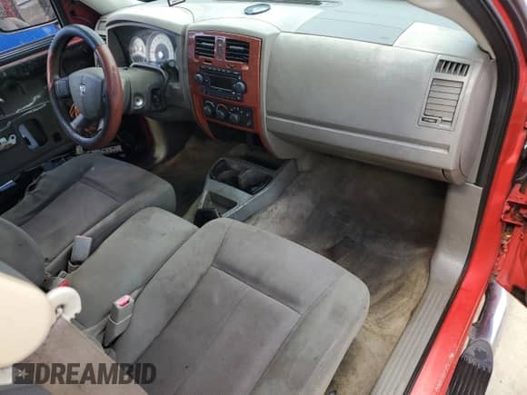 2006 Dodge Dakota SLT z VIN 1D7HE42N76S510319, wystawiony jako Copart lot #75268694 z przebiegiem Nie podano mil oraz Nie do naprawy • Non repairable. Historia ofert i sprzedaży dostępna na DreamBid. Obrazek 8.