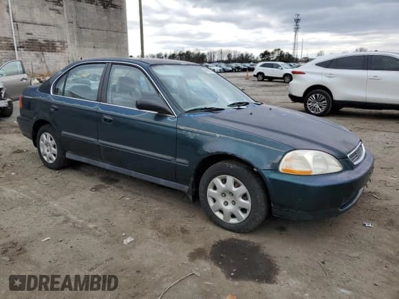 ✅ 1998 Honda Civic LX • VIN: 2HGEJ6571WH557209 • Lot: 41834975. Wystawiony na Copart z przebiegiem 121 944 mil. Bezpłatny archiwum sprzedaży aukcyjnych z USA i szczegółowy raport historii pojazdu na DreamBid. Zdjęcie 4.