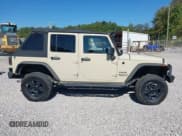 ✅ 2011 Jeep Wrangler Unlimited Sport • VIN: 1J4HA3H1XBL563793 • Lot: 43297255. Listed on IAAI with 118,518 mi. Free auction sales archive from the USA and detailed vehicle history report at DreamBid. Image 13.