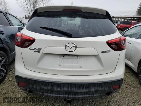 ✅ 2016 Mazda CX-5 Grand Touring • VIN: JM3KE4DY1G0803211 • Лот: 89537495. Опубликован ранее на Copart с пробегом 255 646 миль. Бесплатный доступ к архиву аукционных продаж из США и подробный отчёт об истории автомобиля на DreamBid. Изображение 6.
