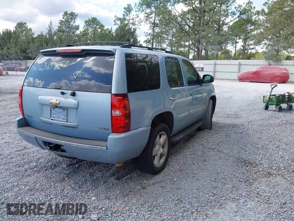 2011 Chevrolet Tahoe LTZ with VIN 1GNSCCE01BR315857, listed as a IAAI auction lot 43455908 with 263,775 mi miles and . Bid and sale history available at DreamBid. Image 4.