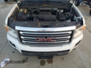 ✅ 2015 GMC Canyon 2WD SLE • VIN: 1GTH5BEA2F1131855 • Lot: 83924504. Wystawiony na Copart z przebiegiem Nie podano. Bezpłatny archiwum sprzedaży aukcyjnych z USA i szczegółowy raport historii pojazdu na DreamBid. Zdjęcie 11.