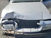 ✅ 2003 Ford Crown Victoria Standard • VIN: 2FAFP73WX3X140146 • Lot: 76968034. Listed on Copart with 27,760 mi. Free auction sales archive from the USA and detailed vehicle history report at DreamBid. Image 11.