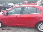 ✅ 2011 Ford Fusion Hybrid • VIN: 3FADP0L39BR308022 • Lot: 42351594. Listed on IAAI with 166,294 mi. Free auction sales archive from the USA and detailed vehicle history report at DreamBid. Image 14.