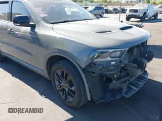 2021 Dodge Durango GT with VIN 1C4RDHDG1MC689049, listed as a IAAI auction lot 42655128 with 112,896 mi miles and . Bid and sale history available at DreamBid. Image 1.