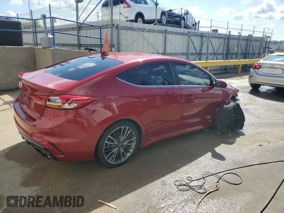 ✅ 2018 Hyundai Elantra Sport • VIN: KMHD04LB5JU718655 • Лот: 84419195. Опубликован ранее на Copart с пробегом 121 784 миль. Бесплатный доступ к архиву аукционных продаж из США и подробный отчёт об истории автомобиля на DreamBid. Изображение 3.