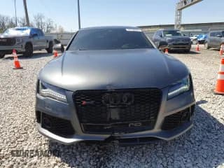 ✅ 2015 Audi RS 7 Prestige • VIN: WUAW2AFC8FN900610 • Лот: 50708225. Опубликован ранее на Copart с пробегом 103 811 миль. Бесплатный доступ к архиву аукционных продаж из США и подробный отчёт об истории автомобиля на DreamBid. Изображение 5.