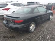 ✅ 2000 Ford Escort ZX2 • VIN: 3FAKP1130YR241240 • Lot: 43779756. Wystawiony na IAAI z przebiegiem 140 684 mil. Bezpłatny archiwum sprzedaży aukcyjnych z USA i szczegółowy raport historii pojazdu na DreamBid. Zdjęcie 4.