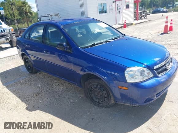 ✅ 2007 Suzuki Forenza • VIN: KL5JD56ZX7K699864 • Лот: 42722241. Опубликован ранее на IAAI с пробегом 131 897 миль. Бесплатный доступ к архиву аукционных продаж из США и подробный отчёт об истории автомобиля на DreamBid. Изображение 1.