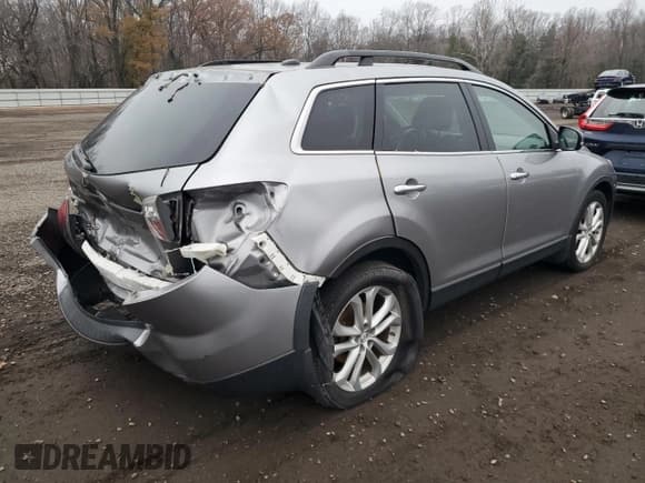 ✅ 2011 Mazda CX-9 Grand Touring • VIN: JM3TB3DV6B0331156 • Лот: 94034625. Опубликован ранее на Copart с пробегом 123 756 миль. Бесплатный доступ к архиву аукционных продаж из США и подробный отчёт об истории автомобиля на DreamBid. Изображение 3.