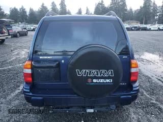 ✅ 2001 Suzuki Vitara JX • VIN: 2S3TD52V916109753 • Lot: 41543965. Wystawiony na Copart z przebiegiem 102 720 mil. Bezpłatny archiwum sprzedaży aukcyjnych z USA i szczegółowy raport historii pojazdu na DreamBid. Zdjęcie 6.