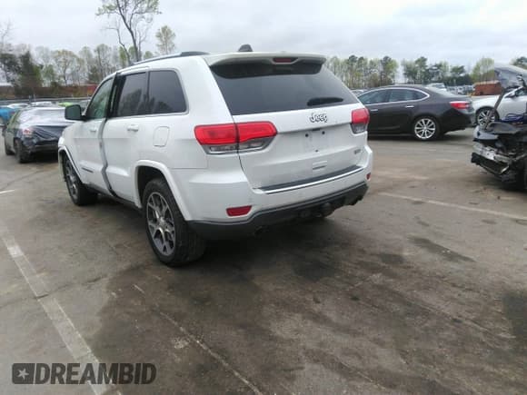 ✅ 2018 Jeep Grand Cherokee Limited • VIN: 1C4RJEBG6JC277652 • Lot: 41940990. Listed on IAAI with 134,013 mi. Free auction sales archive from the USA and detailed vehicle history report at DreamBid. Image 3.