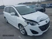 ✅ 2013 Mazda 5 Touring • VIN: JM1CW2CL7D0149735 • Lot: 41958617. Listed on IAAI with 120,488 mi. Free auction sales archive from the USA and detailed vehicle history report at DreamBid. Image 1.