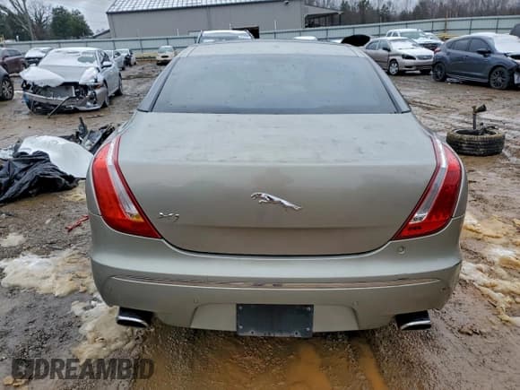 ✅ 2011 Jaguar XJ • VIN: SAJWA1CB4BLV12079 • Lot: 95626675. Listed on Copart with 180,988 mi. Free auction sales archive from the USA and detailed vehicle history report at DreamBid. Image 6.