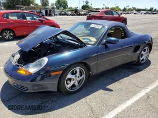 ✅ 2000 Porsche Boxster • VIN: WP0CA2984YU624239 • Lot: 67302385. Listed on Copart with 40,591 mi. Free auction sales archive from the USA and detailed vehicle history report at DreamBid. Image 1.