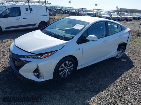 ✅ 2022 Toyota Prius LE • VIN: JTDKAMFP8N3198379 • Lot: 42094943. Listed on IAAI with 14,428 mi. Free auction sales archive from the USA and detailed vehicle history report at DreamBid. Image 17.