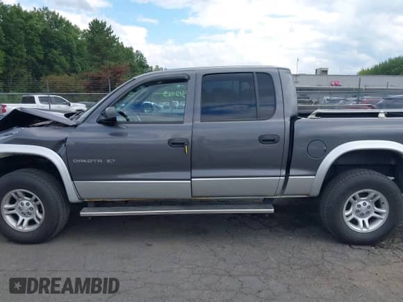 2002 Dodge Dakota SLT с VIN 1B7HG48N02S519241, выставлен на аукционе IAAI как лот 43121163 с пробегом 102 842 миль миль и . История ставок и продаж доступна на DreamBid. Изображение 14.