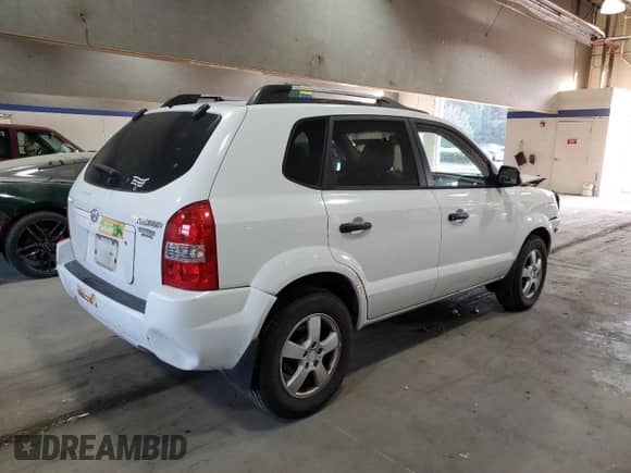2005 Hyundai Tucson GL with VIN KM8JM12BX5U067598, listed as a Copart auction lot 81336444 with 102,027 mi miles and Clean title. Bid and sale history available at DreamBid. Image 3.