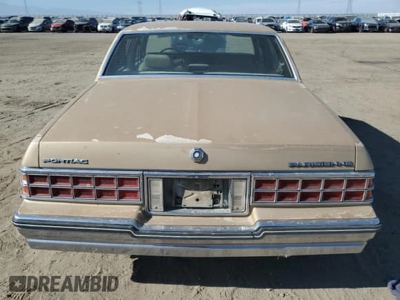 ✅ 1986 Pontiac Parisienne • VIN: 1G2BT69Y2GX267691 • Lot: 79337604. Listed on Copart with 55,458 mi. Free auction sales archive from the USA and detailed vehicle history report at DreamBid. Image 6.