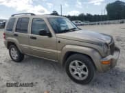 ✅ 2004 Jeep Liberty Limited • VIN: 1J4GK58KX4W115570 • Lot: 64292915. Listed on Copart with 106,843 mi. Free auction sales archive from the USA and detailed vehicle history report at DreamBid. Image 4.