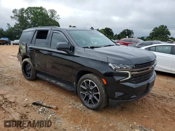 2022 Chevrolet Tahoe RST with VIN 1GNSKRKD7NR301298, listed as a Copart auction lot 67618945 with 68,577 mi miles and Salvage title. Bid and sale history available at DreamBid. Image 4.