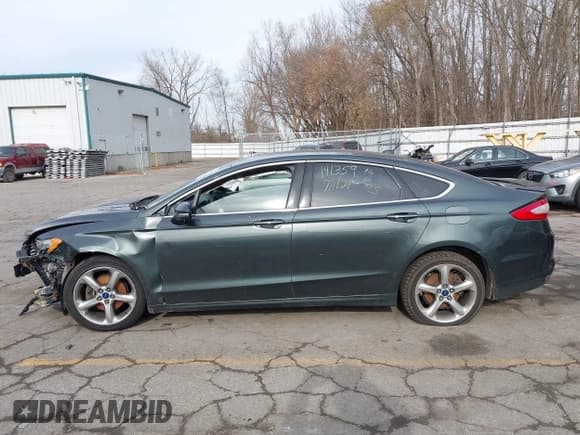 ✅ 2016 Ford Fusion Titanium • VIN: 3FA6P0K92GR135594 • Lot: 43749043. Listed on IAAI with 195,125 mi. Free auction sales archive from the USA and detailed vehicle history report at DreamBid. Image 13.