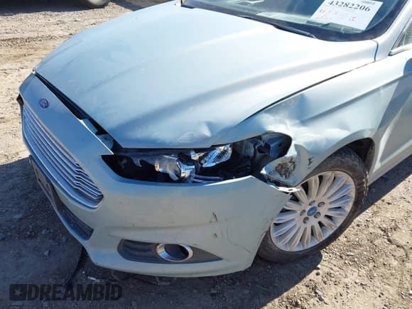 ✅ 2013 Ford Fusion SE Hybrid • VIN: 3FA6P0LU2DR148831 • Лот: 43282206. Опубликован ранее на IAAI с пробегом 160 117 миль. Бесплатный доступ к архиву аукционных продаж из США и подробный отчёт об истории автомобиля на DreamBid. Изображение 6.