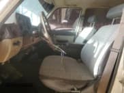 ✅ 1983 Toyota Land Cruiser • VIN: JT3FJ60G6D0065114 • Lot: 63304565. Listed on Copart with 176,757 mi. Free auction sales archive from the USA and detailed vehicle history report at DreamBid. Image 7.