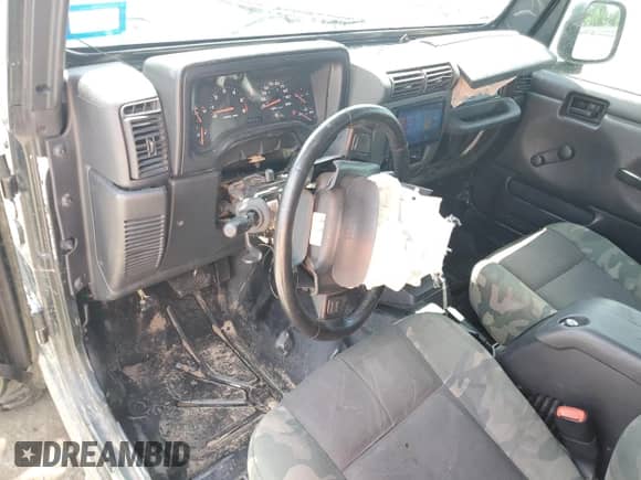 2005 Jeep Wrangler X с VIN 1J4FA39S45P319326, выставлен на аукционе Copart как лот 64983495 с пробегом 156 551 миль миль и Списание • Salvage title. История ставок и продаж доступна на DreamBid. Изображение 8.
