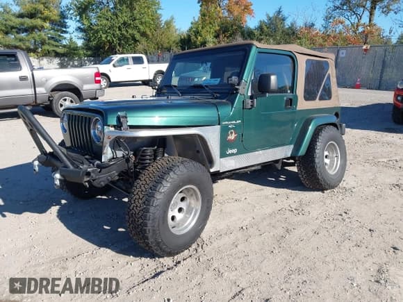 ✅ 2001 Jeep Wrangler Sahara • VIN: 1J4FA59S31P362769 • Лот: 43488240. Опубликован ранее на IAAI с пробегом 178 182 миль. Бесплатный доступ к архиву аукционных продаж из США и подробный отчёт об истории автомобиля на DreamBid. Изображение 2.