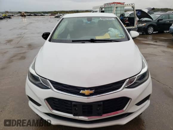 2017 Chevrolet Cruze LT z VIN 1G1BE5SM6H7167689, wystawiony jako Copart lot #66031372 z przebiegiem 143 755 mil mil oraz . Historia ofert i sprzedaży dostępna na DreamBid. Obrazek 5.