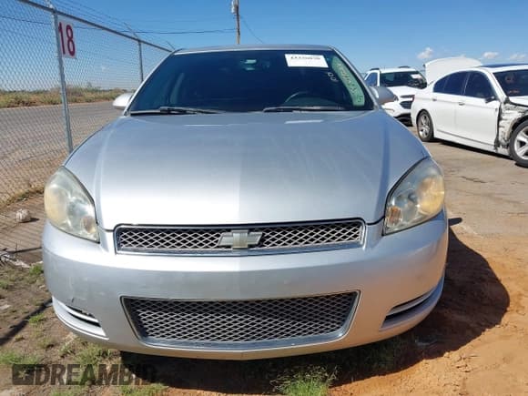 ✅ 2014 Chevrolet Impala LT • VIN: 2G1WB5E35E1114228 • Lot: 43336030. Listed on IAAI with 123,218 mi. Free auction sales archive from the USA and detailed vehicle history report at DreamBid. Image 12.