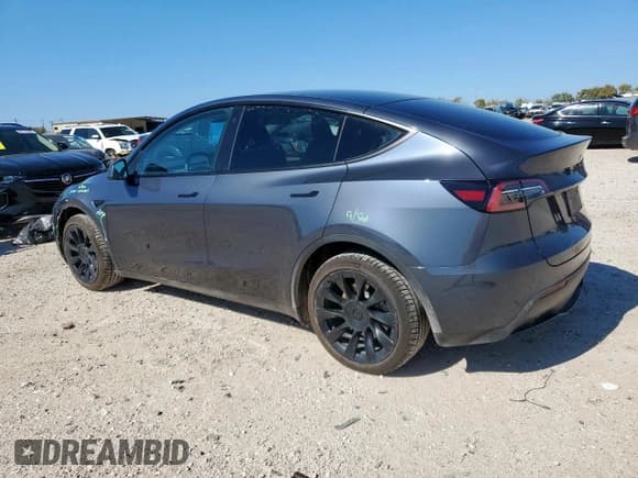 ✅ 2023 Tesla Model Y Long Range • VIN: 7SAYGDEE3PA057847 • Лот: 90979345. Опубликован ранее на Copart с пробегом 51 020 миль. Бесплатный доступ к архиву аукционных продаж из США и подробный отчёт об истории автомобиля на DreamBid. Изображение 2.